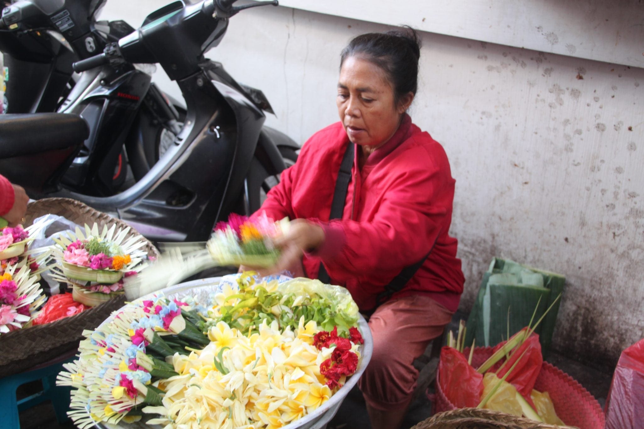 The colourful petals can be bought at the local market
