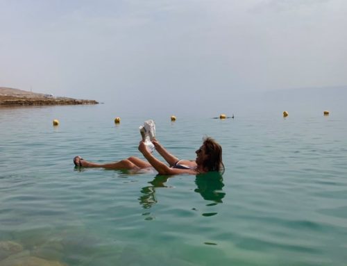 Reading the newspaper in the Dead Sea